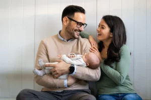 parents with newborn ready for financial planning